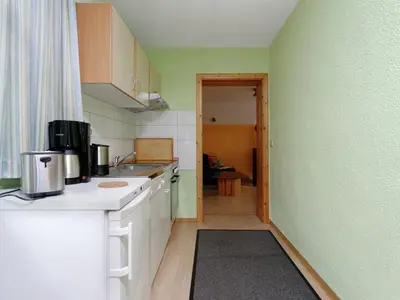 Küche/Küchenzeile in der Unterkunft Elite-Ferienhaus mit Garten in Spreenhage