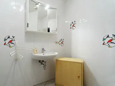 Ein Badezimmer in der Unterkunft Elite-Ferienhaus mit Garten in Spreenhage