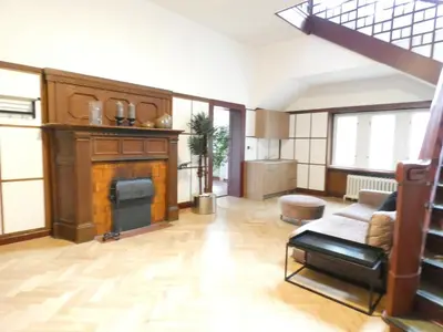 Ein Sitzbereich in der Unterkunft 3 Bett Zimmer in Villa mit Gemeinschaftsbad