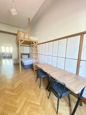 Ein Bett oder Betten in einem Zimmer der Unterkunft 3 Bett Zimmer in Villa mit Gemeinschaftsbad