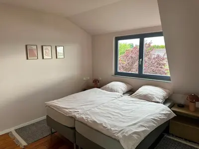 Ein Bett oder Betten in einem Zimmer der Unterkunft Havelhaus Werder