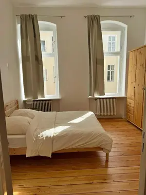 Ein Bett oder Betten in einem Zimmer der Unterkunft Stylish Flat in Prime Location