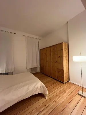 Ein Bett oder Betten in einem Zimmer der Unterkunft Stylish Flat in Prime Location