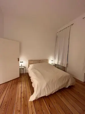 Ein Bett oder Betten in einem Zimmer der Unterkunft Stylish Flat in Prime Location