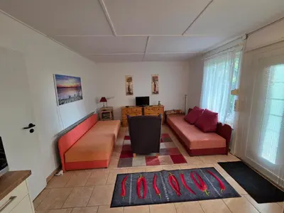 Ein Bett oder Betten in einem Zimmer der Unterkunft Gartenidyll am Teich