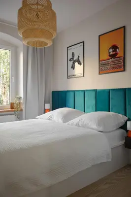 Ein Bett oder Betten in einem Zimmer der Unterkunft nestup - Zentrales 120 qm Design-Loft mit Balkon