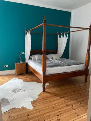 Ein Bett oder Betten in einem Zimmer der Unterkunft Altbau Prenzlauer Berg - 3 Zimmer - 2 Schlafzimmer