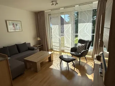 Ein Sitzbereich in der Unterkunft Apartment an der Saarow Therme