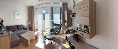 Ein Sitzbereich in der Unterkunft Apartment an der Saarow Therme