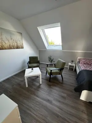 Ein Bett oder Betten in einem Zimmer der Unterkunft FeWo-Johannisthal