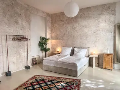 Ein Bett oder Betten in einem Zimmer der Unterkunft Loft-style design apartment in the heart of Berlin