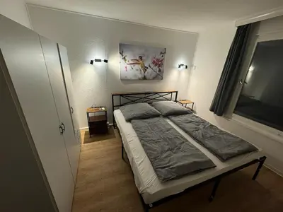 Ein Bett oder Betten in einem Zimmer der Unterkunft Feriendorf Seddiner See - Bungalow 3