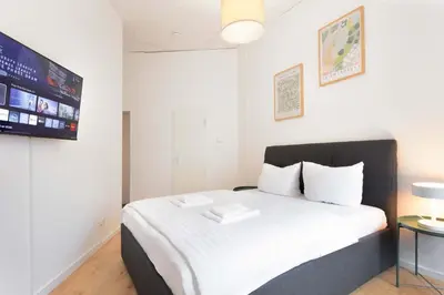 Ein Bett oder Betten in einem Zimmer der Unterkunft central I 2 bedroom I fast Wifi