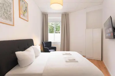 Ein Bett oder Betten in einem Zimmer der Unterkunft central I 2 bedroom I fast Wifi