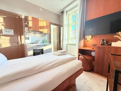 Ein Bett oder Betten in einem Zimmer der Unterkunft Amaroo - Boarding & Serviced Apartments 