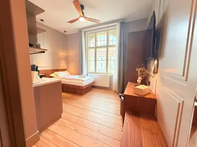Ein Bett oder Betten in einem Zimmer der Unterkunft Amaroo - Boarding & Serviced Apartments 