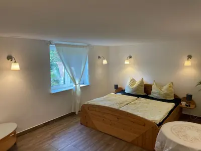 Ein Bett oder Betten in einem Zimmer der Unterkunft Wohnen im Grünen-Souterrain