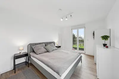 Ein Bett oder Betten in einem Zimmer der Unterkunft cruwzo Home Wildau