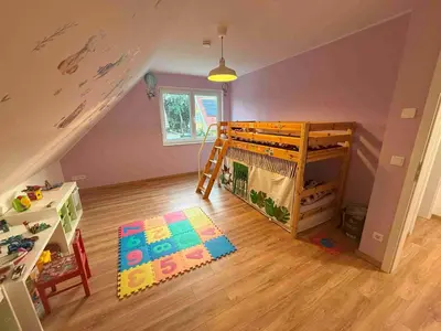 Ein Bett oder Betten in einem Zimmer der Unterkunft EFH Ferch