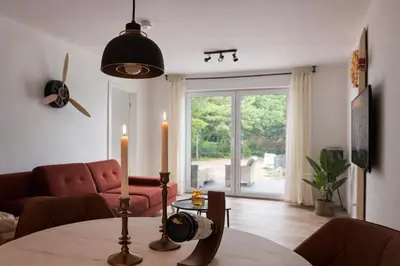 Ein Sitzbereich in der Unterkunft Apartment mit Seeblick Ruppinersee
