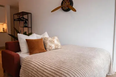 Ein Bett oder Betten in einem Zimmer der Unterkunft Apartment mit Seeblick Ruppinersee
