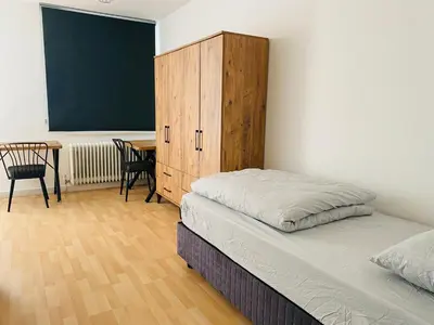 Ein Bett oder Betten in einem Zimmer der Unterkunft 2 Bett Zimmer in Villa im Grunewald