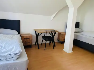 Ein Bett oder Betten in einem Zimmer der Unterkunft 2 Bett Zimmer in Villa im Grunewald