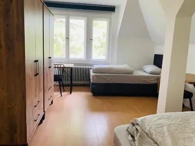 Ein Bett oder Betten in einem Zimmer der Unterkunft 2 Bett Zimmer in Villa im Grunewald