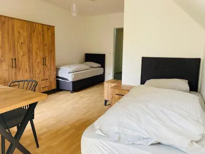 Ein Bett oder Betten in einem Zimmer der Unterkunft 2 Bett Zimmer in Villa im Grunewald