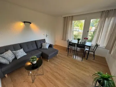 Ein Sitzbereich in der Unterkunft Feriendorf Seddiner See - Bungalow 1