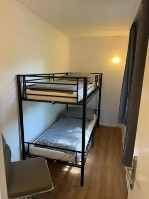 Ein Bett oder Betten in einem Zimmer der Unterkunft Feriendorf Seddiner See - Bungalow 1