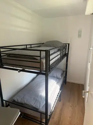 Ein Bett oder Betten in einem Zimmer der Unterkunft Feriendorf Seddiner See - Bungalow 4