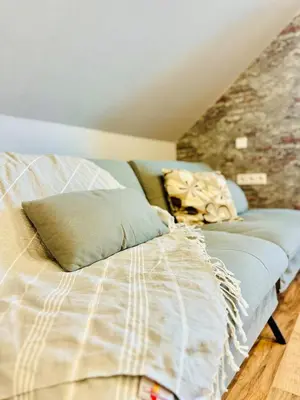 Ein Bett oder Betten in einem Zimmer der Unterkunft Ferienwohnung Prieros am Langer See mit Klima