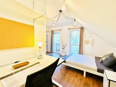Ein Bett oder Betten in einem Zimmer der Unterkunft Ferienwohnung Prieros am Langer See mit Klima
