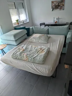 Ein Sitzbereich in der Unterkunft 2-room guest apartment for 2 people