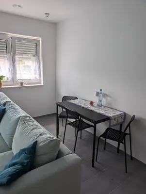 Ein Sitzbereich in der Unterkunft 2-room guest apartment for 2 people