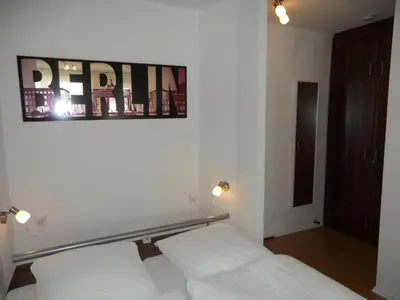 Ein Bett oder Betten in einem Zimmer der Unterkunft Stars Berlin Apartments