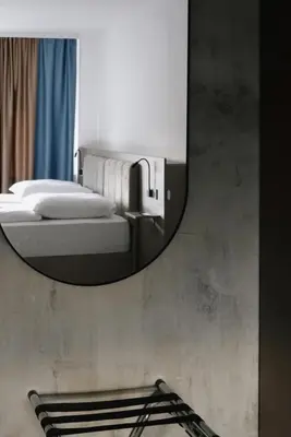 Ein Bett oder Betten in einem Zimmer der Unterkunft Autohof Apartments - Concept Stay
