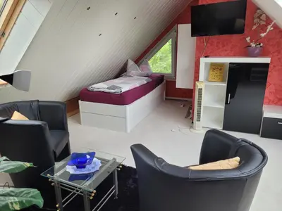 Ein Sitzbereich in der Unterkunft Ferienwohnungen am Krossinsee