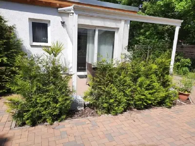 Ein Garten an der Unterkunft Ferienwohnungen am Krossinsee