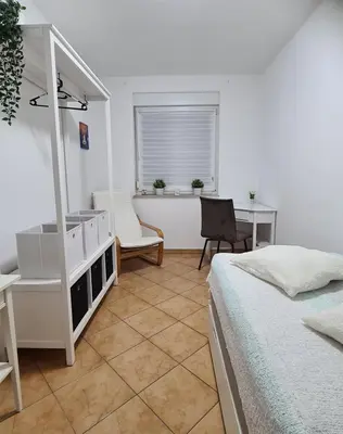Ein Bett oder Betten in einem Zimmer der Unterkunft Ferienwohnung inmitten von Seen