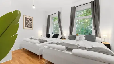 Ein Bett oder Betten in einem Zimmer der Unterkunft Design Suite - Sauna & zentral - 75 QM