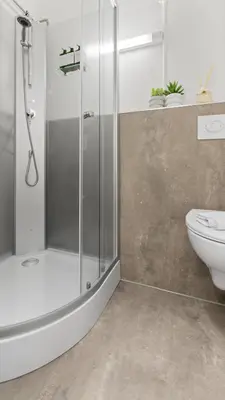 Ein Badezimmer in der Unterkunft Design Suite - Sauna & zentral - 75 QM