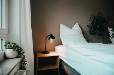 Ein Bett oder Betten in einem Zimmer der Unterkunft Gemütliche 2-Zimmer-Wohnung in Fürstenwalde an der Spree