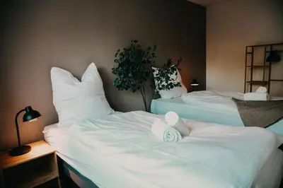 Ein Bett oder Betten in einem Zimmer der Unterkunft Gemütliche 2-Zimmer-Wohnung in Fürstenwalde an der Spree