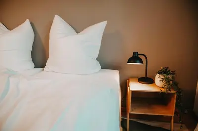 Ein Bett oder Betten in einem Zimmer der Unterkunft Gemütliche 2-Zimmer-Wohnung in Fürstenwalde an der Spree