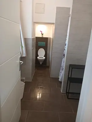 Ein Badezimmer in der Unterkunft Studio Apartments Alfred A1