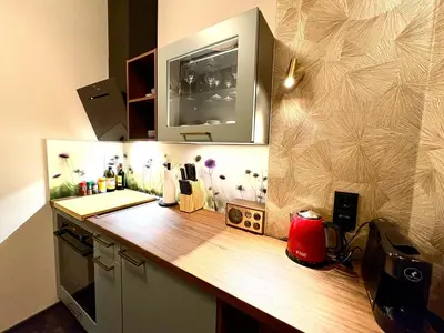 Küche/Küchenzeile in der Unterkunft Deluxe Apartment mit Balkon und Frühstück im Hotel Reindahls