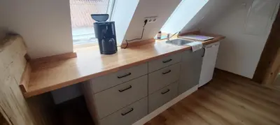 Küche/Küchenzeile in der Unterkunft Wustermark Ferienwohnung Dorfanger 8