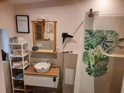 Ein Badezimmer in der Unterkunft Ferienwohnung am Schlosspark